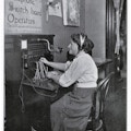 Woman operating switchboard