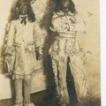 Photograph of two students at the Wright Oral School dressed as Native Americans.