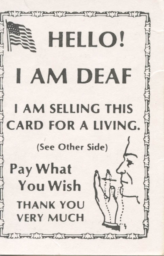 Card with American flag, text, and drawing of face and hand.