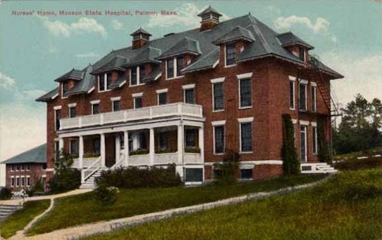 Postcard image of a three-story brick building.