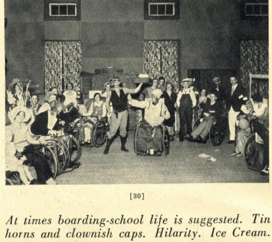 A group of young people in costume, many in wheelchairs.