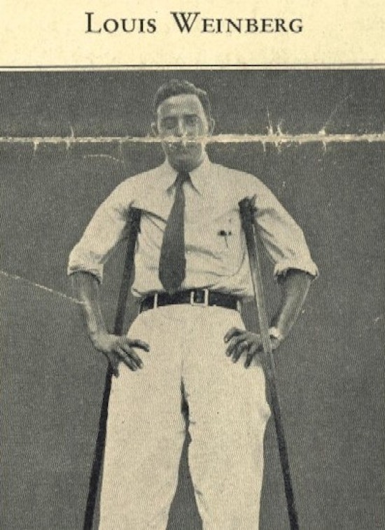 Photograph of a young man standing with crutches.