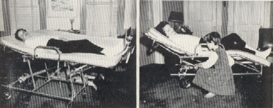 A woman in a hospitali cot with a hydraulic lift.