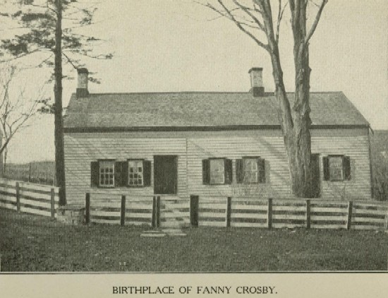 A plain one-story house with a fence in front.