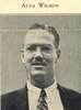 A photograph of a young man with glasses.