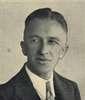 A photograph of a young man wearing a tie.