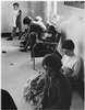 People sitting in a hall.