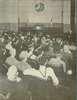 People sitting in pews in a church.