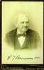 Formal portrait of P.T. Barnum wearing suit and bow tie