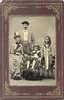 Portrait of mother, father, and two children, one in a wheelchair.