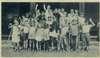 Group photograph of campers waving.  One girl is circled in pen and labelled "Me."
