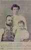 A man, woman and child pose for a family portrait; man is wearing neck/head brace.