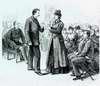 A young deaf woman uses a small bent piece of metal on a short stick, clamped in her teeth to hear a man.
