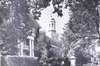 Photograph of Clerc Memorial in front of school building.