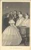 Mr. and Mrs. Tom Thumb and their wedding party stand on top of a piano and entertain guests.