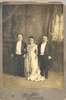 Three short-statured people, including Lavinia Warren, dressed formally.