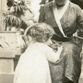 Helen Keller with John D. Wright's baby.