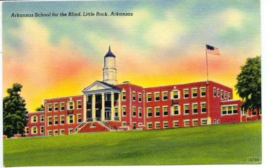 Arkansas School For The Blind, Little Rock, Arkansas. A three-story brick building with pillars at entrance.