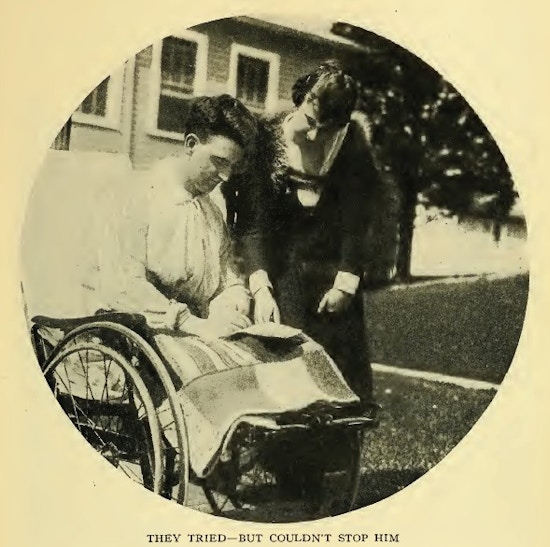 Man in wheelchair reading aletter, a woman standing net to him.