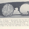 Close-up of safety goggles, one lens shattered.
