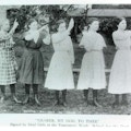Five young women standing on the grounds of Vancouver, Washington School for the Deaf sign the hymn Nearer My God, To Thee.