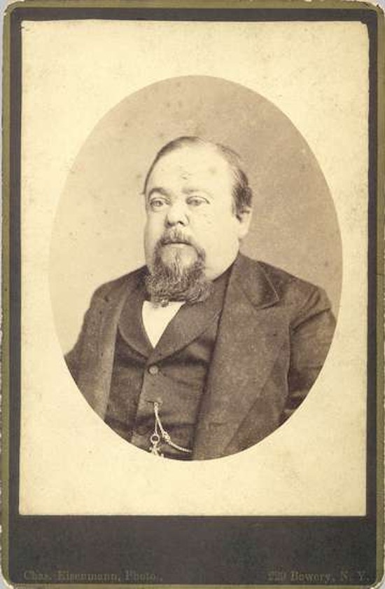 Bust view, oval format, of Tom Thumb in his later years, with beard and wearing coat and vest.