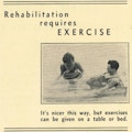 A physical therapist works on a man in a pool.