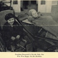 Two smiling children in wheelchairs, one reclining.