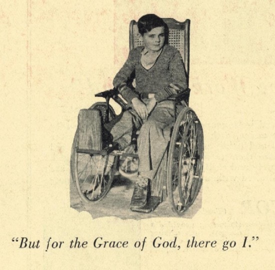 A boy sitting in a wheelchair.