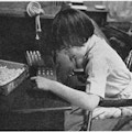 A child works with a peg board.