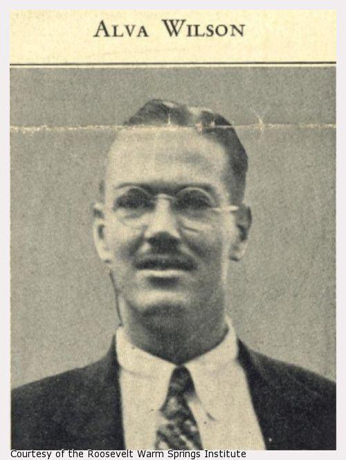 A photograph of a young man with glasses.