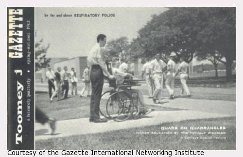 Campus scene with a young woman in a wheelchair.
