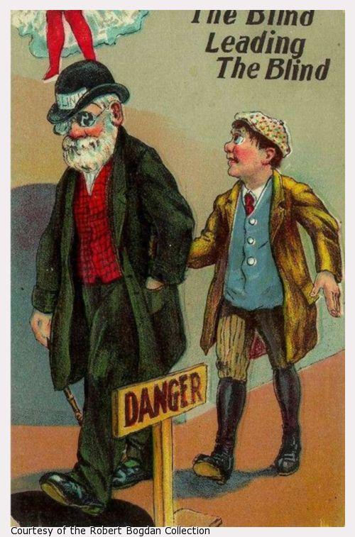 Bright color illustration of an elderly blind man leading a young blind boy past a "Danger" sign