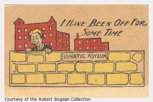 A cartoon of  man looking over the wall of an insane asylum.